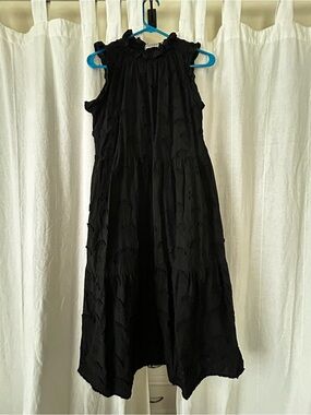 Sleeveless Black Midi Dress with Ruffled Neckline